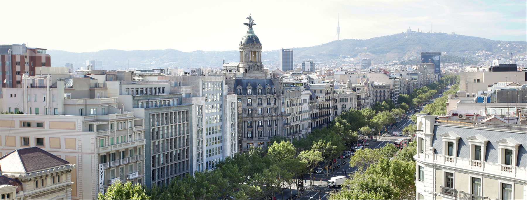 Renta Corporación, comprar edificio barcelona y madrid